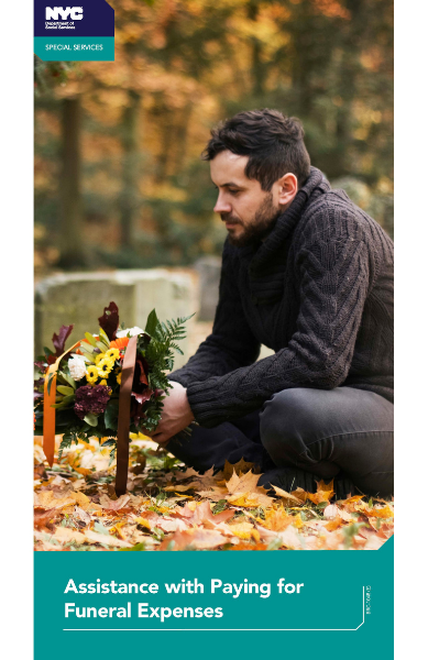 Image of a man at a grave with flowers