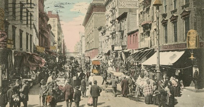 People walking on a street in old Lower East Side