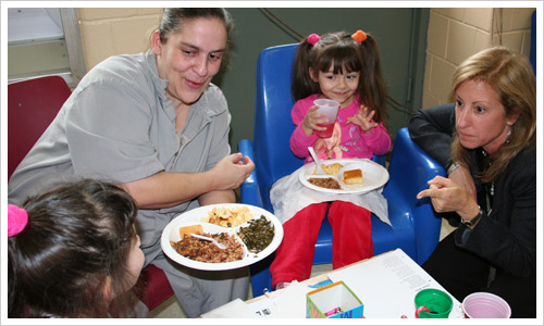 NYFC Executive Director Susan Magazine and the Monsegur Family.