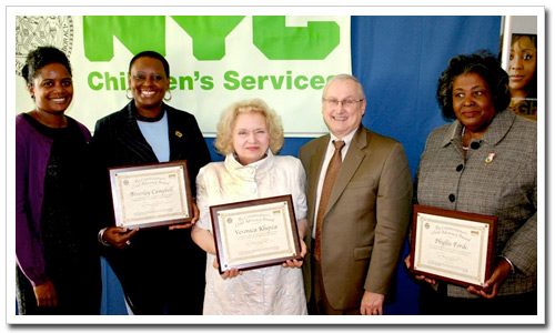 Caption: (l-r) Deputy Commissioner Melanie Hartzog, honoree Beverley Campbell, honoree Veronica Klujsza, Commissioner John Mattingly and honoree Phyllis Forde.