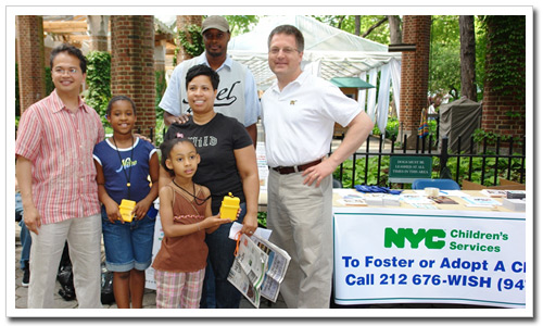 ACS Assistant Commissioner Dr. Angel Mendoza, Jr, foster parents Barrington and Nedra Woody with daughters Ashley, 8, and Taylor, 6, and ACS Associate Commissioner Eric Nicklas enjoying Central Park.