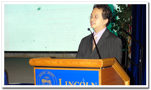 Dr. Mendoza addresses the audience at the Bronx Child Safety Medical Summit.