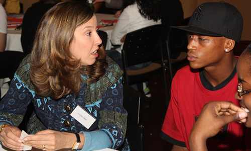 Leslee Dart, gives some very important pointers on the entertainment industry to two of the teens attending the Network to Success event.
