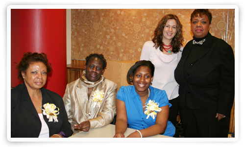Graduates seated from left Alice Fleetwood, Tawana Wright, and Teyora Graves. Standing are Dana Guyet, left, and Sabra Jackson.