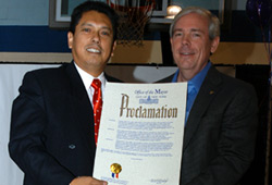 ACS Adoption Unit Director Jorge Pastor presents Mayor Michael Bloomberg’s Adoption Proclamation to Tom Atwood, President and CEO of the National Council for Adoption, at the Kids at Heart celebration.