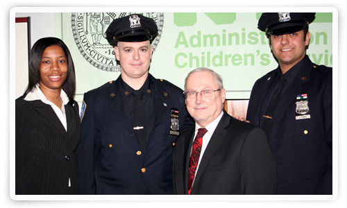 Child Protective Specialist Patrice McRae, Port Authority Police Officers John Collins and Christopher Romig with Commissioner John Mattingly at the awards presentation. Child Protective Specialist Patrice McRae, Port Authority Police Officers John Collins and Christopher Romig with Commissioner John Mattingly at the awards presentation.