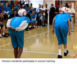Horizon residents participate in soccer training.
