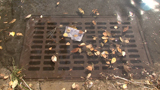 How do I report a defective sewer grate