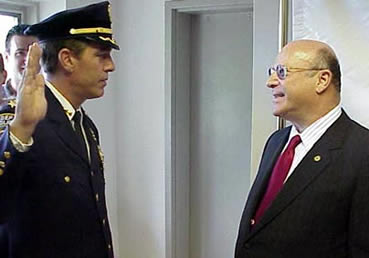 Commissioner Miele swears in new police chief Robert T. Varieur. 