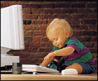 toddler at computer