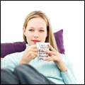woman relaxing with cup of coffee