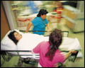 patient being wheeled into hospital