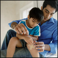 child with bandaid on knee