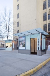 Front and side view of Newsstand provided by Cemusa