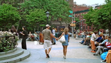 Couple walking in public plaza