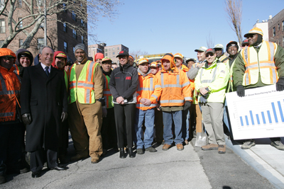 Image of Mayor Bloomberg Filling Pothole