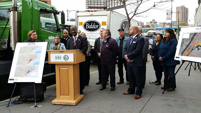 DOT’s Assistant Commissioner Charles Ukegbu announces the 500 truck milestone in the Bronx.