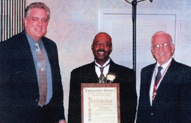 Sanitation Chief James Sims receives Proclamation from Community Mayors