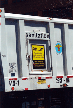 DSNY publicizes '911' and '311' on Sanitation trucks