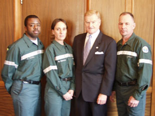 Commissioner Doherty and Sanitation workers present newly designed Sanitation Worker button-down uniform