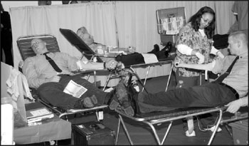 Probationary Firefighters do their part to support our injured members by rolling uptheir sleeves and donating blood at the Fire Academy on February 1.