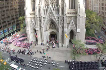 As family members left the service, 343 firefighters held flags on the steps of St. Patrick&rsquo;s Cathedral to honor the lives of FDNY members lost on September 11, 2001