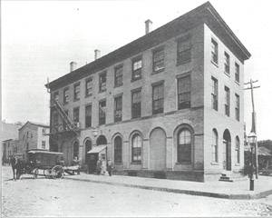Ambulance Surgeons removing a patient to the Gouvernor Hospital, 1885.