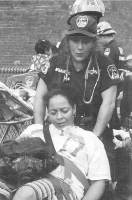 EMS worker with patient