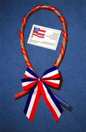 911 New York State quarters fill this memorial wreath donated by the first grade class at Sarah Adams School, Lake Zurich, Illinois