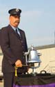 Firefighter ringing bell at the Rock