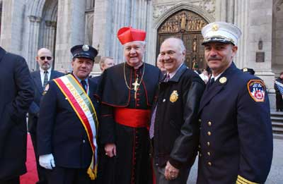 Fire Commissioner Nicholas Scoppetta, Columbia Association president, Cardinal Egan and Chief Cassano at the Parade