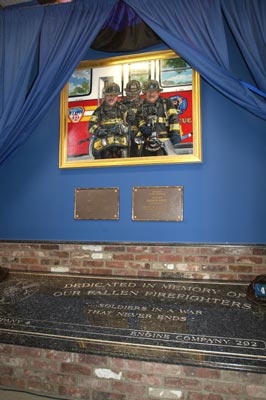 Plaque and painting dedicated to FDNY Rescue 4 Firefighters Ford and Fahey.