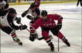 Lieutenant Tom Frizalone (C) evades two NYPD players