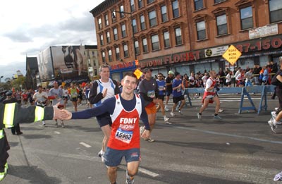 FDNY runner getting a high five during race