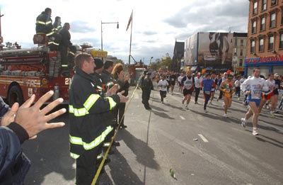 FDNY members cheering on the racers