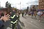 Members of the FDNY looking  at the runners passing by