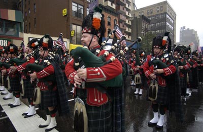 Pipes and Drums stand in formation.