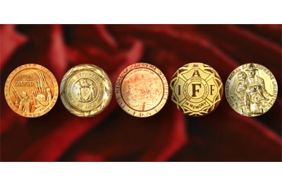 Medals wre presented to the families of the fallen Members.