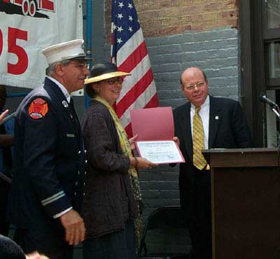 Marie Roberts receives proclamation from State Senator Karl Kruger
