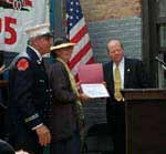 Granddaughter, Marie Roberts, receives a proclamation