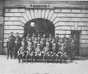 Engine 7 members on front of quarters