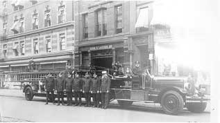 Members in fron of Old Apparatus Ladder 22