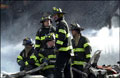Firefighters searching the crash area of Flight 587