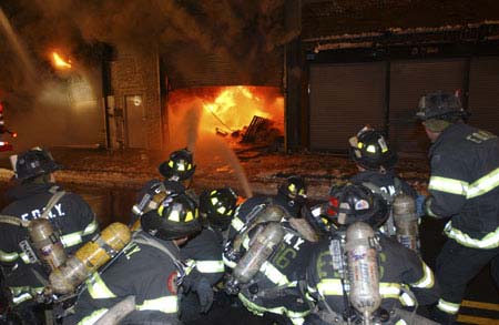 Engine Company knocking down the fire