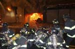 Engine Company knocking down the fire