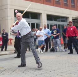 On his first attempt Nick 'the Stick' Scoppetta set the tone for the afternoon by launching a huge 160 footer sparking a rousing cheer from the home team crowd and squashing Police Commissioner Kelly's long ball dreams.