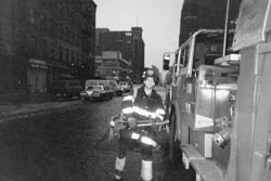 Queens Box 33-1355, 101-02 Rockaway Boulevard, September 25, 1998.  Members operate at a vacant commercial building fire.