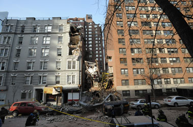 A massive crane fell 20 stories from a building under construction at 303 West 51st Street in Manhattan, killing five construction workers. The accident damaged three buildings and crushed a fourth.
