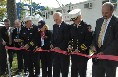 (L to R) Stu Suss, Provost, Kingsborough Community College; William Keller, Vice President and Head of Facilities, Kingsborough Community College; Patrick McNally, FDNY Chief of Operations; Dr. Regina Peruggi, President, Kingsborough Community College; Nicholas Scoppetta, Fire Commissioner; Salvatore Cassano, FDNY Chief of Department; and John Benanti, Deputy Fire Commissioner Bureau of Technology and Support Services.