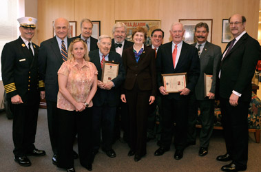 The FDNY graciously accepted a check from the Board of the New York Fire Safety Foundation. (L to R) Chief of Department Salvatore Cassano, Fire Commissioner Nicholas Scoppetta, Ed Livingston, Victoria Pitcavage, John Mulligan, Mike O'Neal, FDNY Family Assistance Unit Assistant Commissioner Suzanne Sebert, John Murphy, Dr. Gerald Lynch, John McDonnell and Harvey Watkins.